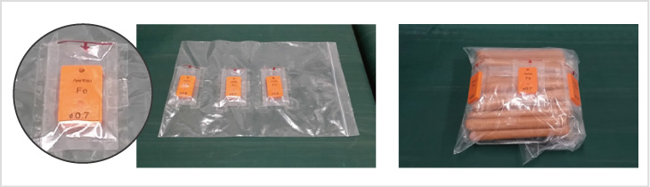 Hình 2-1: Gá lắp cho các miếng thử nghiệm trong loại bỏ túi (Lưu ý: Trong hoạt động thực tế, một mẫu thử nghiệm duy nhất được sử dụng.)